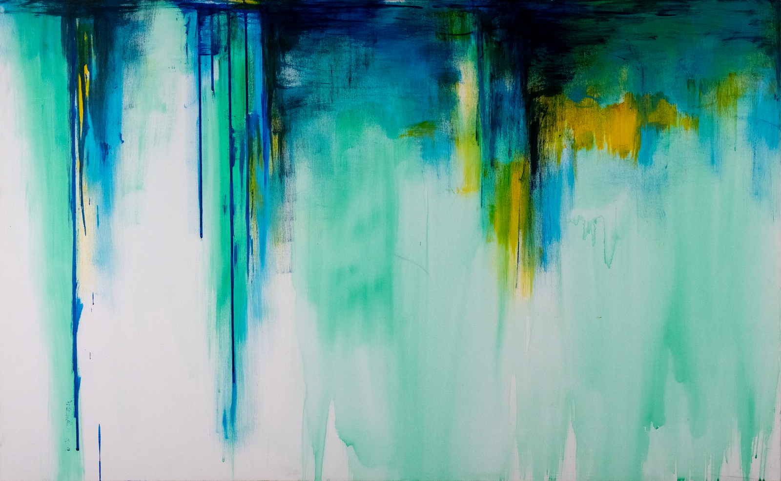 Aqua, green and blue, yellow splattering falling down the canvas. A study of emotion and mood.